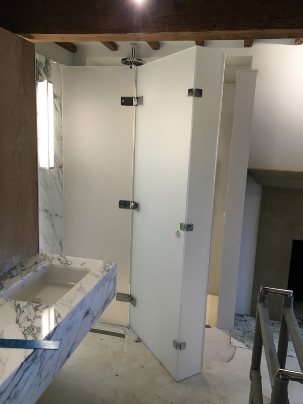 Bespoke frosted glass shower enclosure in Hounslow luxury bathroom