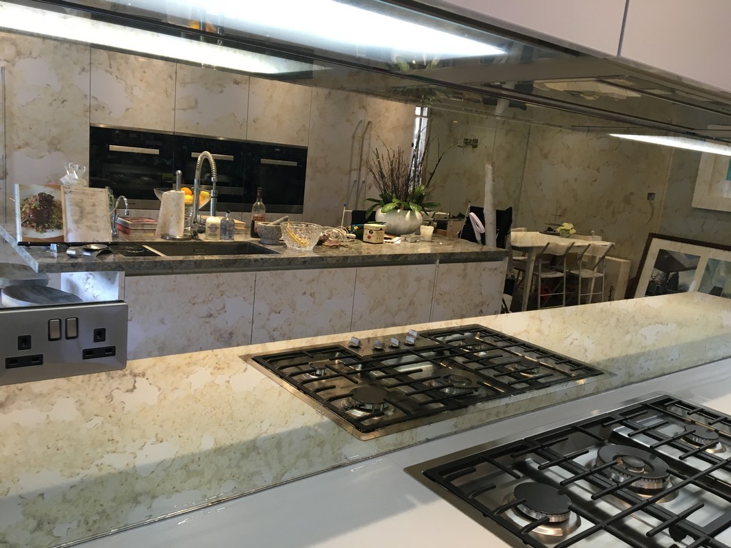 Mirror glass splashback in Hounslow luxury kitchen